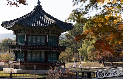 Tourists dressed in Hanbok, a traditional Korean clothing, visit the Gyeongbokgung Palace in Seoul, South Korea. EPA