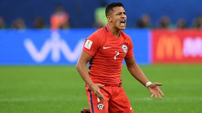 Alexis Sanchez, seen in a Chile shirt during the Confederations Cup, looks likely to continue playing in his Arsenal kit in 2017/18. Franck Fife / AFP