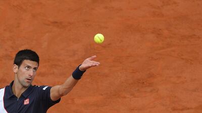 Novak Djokovic shown serving at the 2014 Rome Masters. Andreas Solaro / AFP / May 18, 2015