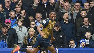 Arsenal’s Alex Iwobi celebrates scoring the second goal making the score 2-0 during the Premier League match between Everton and Arsenal at the Goodison park, Liverpool, Britain, 19 March 2016. EPA/PETER POWELL