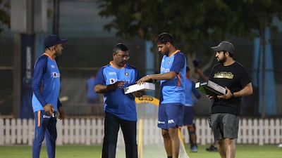 The Indian team practise at the academy ground. AFP