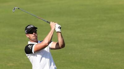 Henrik Stenson is very much in the running for the Race to Dubai title this year. Karim Sahib / AFP