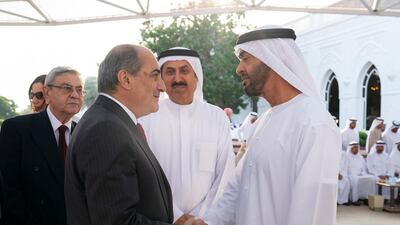 Sheikh Mohamed bin Zayed, Crown Prince of Abu Dhabi and Deputy Supreme Commander of the Armed Forces (R), greets Demetris Syllouris, President of the Cypriot Parliament (2nd L), during a Sea Palace barza. Seen with Saqr bin Ghobash Saeed Ghobash, chairman of the UAE Federal National Council (FNC) (C). Ryan Carter for the Ministry of Presidential Affairs