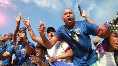 Fans celebrate in the stands after Cape Verde defeated Eswatini 3-0. AP