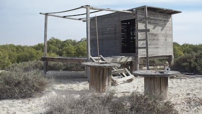 An abandoned fisherman's hut at the Abu Dhabi mangrove shows visitors a relic from the past. Lee Hoagland / The National