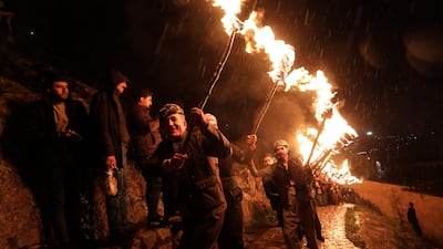 Another Nowruz torchlit procession in Akre, northern Iraq's autonomous Kurdish region. Millions of people across the Middle East, Asia and eastern Europe celebrate the Persian New Year. AFP