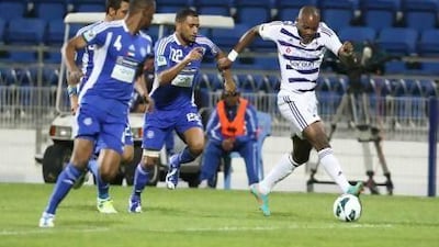 Jires Kembo Ekoko, right, the Al Ain forward, caused the Al Nasr defence problems throughout the night as the Pro League champions beat their hosts 2-0 in Dubai. Mike Young / The National