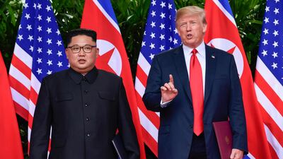 In this June 12, 2018, file photo, US President Donald Trump makes a statement before saying goodbye to North Korea leader Kim Jong Un after their meetings at the Capella resort on Sentosa Island in Singapore. Susan Walsh / AP