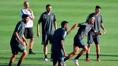 Cristiano Ronaldo training with teammates. AFP