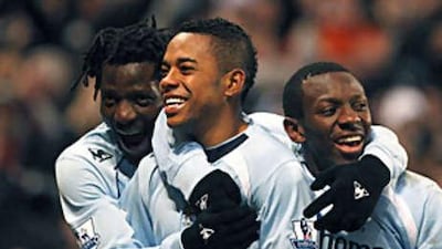 Robinho celebrates after scoring his ninth goal of the season.