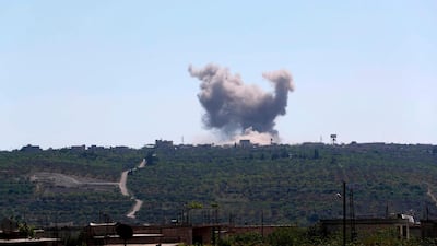 Smoke billows following bombardment by regime forces on the village of Ibdita, Idlib. AFP