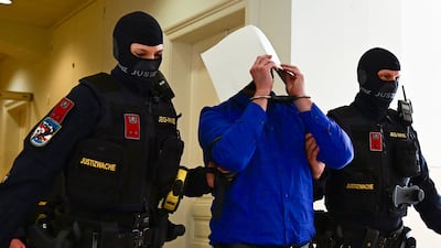 Defendant Beran A is led out of the coutroom on the first day of his trial over a Taylor Swift concert plot, in Wiener Neustadt, in Austria. Getty Images