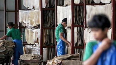 Workers are quitting rubber plantations as rubber prices slump toward a six-year low, and earnings now less than the minimum wage. Dario Pignatelli / Bloomberg