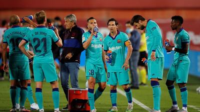 Barcelona players during the drinks break. Reuters