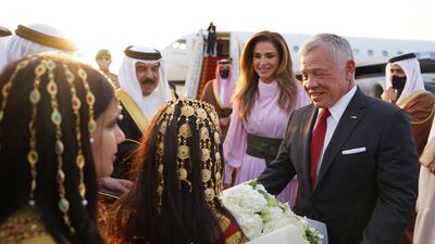 Jordan's Queen Rania and King Abdullah II being received by Bahrain's King Hamad bin Isa al-Khalifa at the Sakhir Air Base, ahead of the Jordan royals' visit to Abu Dhabi, UAE. Photo: Yousef Allan / Jordanian Royal Palace