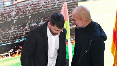 Sergio Aguero talks to Pep Guardiola at Camp Nou. Reuters