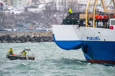 Photo of a fibre optic cable being pulled ashore from the cable-laying ship 'Pleijel' at the entrance to the port of Sassnitz in Germany. Getty Images