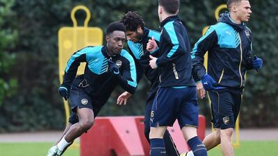 epa05175173 Arsenal striker Danny Welbeck (L) during a training session with teammates at Arsenal's training complex at London Colney, north of London, Britain, 22 February 2016. Arsenal play Barcelona in a Champions League Round of 16 soccer match at the Emirates Stadium in London 23 February. EPA/ANDY RAIN