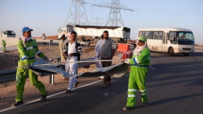 The accident happened at 7:53am as the bus, carrying 45 workers, was headed to a nearby palace. Silvia Razgova / The National