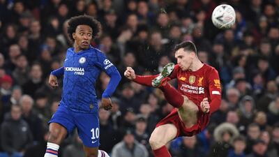Willian in action against Andrew Robertson during the FA Cup fifth round tie between Chelsea and Liverpool. EPA