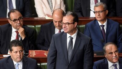 Tunisian health minister Slim Chaker (centre), who died on October 8, 2017, is seen here attending a parliamentary session in Tunis on September 11, 2017. Fethi Belaid / AFP
