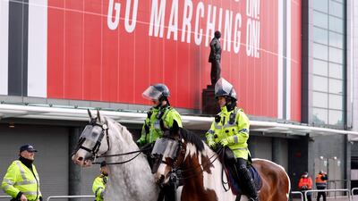 Police officers outside Old Trafford on Thursday in anticipation of more protest from fans. Reuters