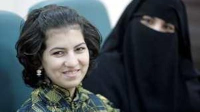 Anoud Faraj, 13, left, with her mother Suhair Khalil, at a press conference at Sheikh Khalifa Medical City in Abu Dhabi, yesterday.