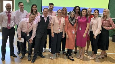 Andi Price, a class teacher at Ranches Primary School, poses with his colleagues dressed in shades of pink before the Covid-19 pandemic. Courtesy: Andi Price