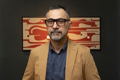 Wissam Shawkat first learned the craft of calligraphy aged 10 in Basra. Antonie Robertson / The National