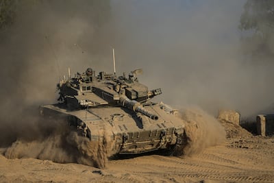 An Israeli tank near the Israeli-Gaza border seen from southern Israel, Sunday, July 14, 2024. AP