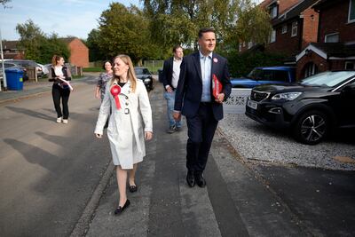 Labour's shadow health secretary Wes Streeting and the party's candidate for the Tamworth by-election Sarah Edwards canvas. Getty Images
