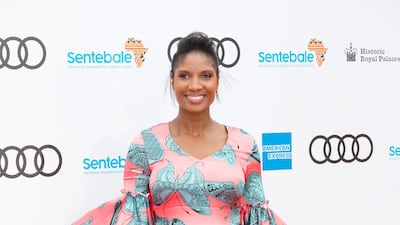 Retired British track and field athlete Denise Lewis poses on the red carpet. EPA