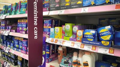 Sanitary products and tampons on sale in a Glasgow supermarket. The 'tampon tax' cut is part of a wider government initiative to end “period poverty” in Britain. PA Images via Getty Images