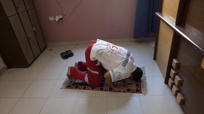 Hassan Niesan, of Gaza’s Red Crescent team prays at their headquarters in Gaza City.