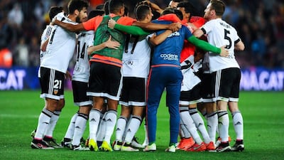 Valencia CF players celebrate after defeating FC Barcelona at the end of the La Liga match between FC Barcelona and Valencia CF at Camp Nou on April 17, 2016 in Barcelona, Spain. (Photo by David Ramos/Getty Images)