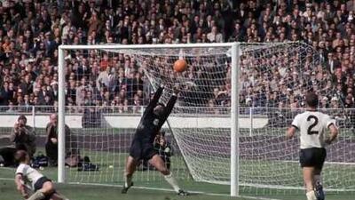 Was it a goal? After 44 years, the second goal by Geoff Hurst, far left in red shirt, in England's World Cup triumph still sparks debate.