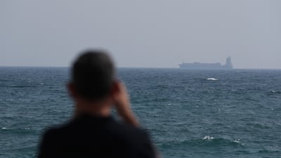 A container ship sails through the Gulf of Oman. EPA