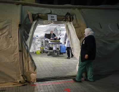 Palestinian patients arrive at the UAE floating hospital in the port of Al Arish, Egypt. Victor Besa / The National