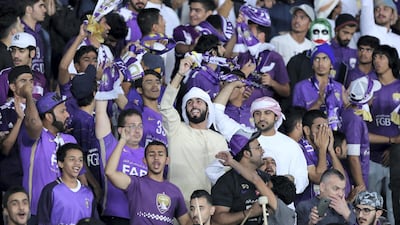 Al Ain supporters celebrate their team's goal against Real Madrid in the Club World Cup final at Zayed Sports City Stadium, Abu Dhabi. Chris Whiteoak / The National