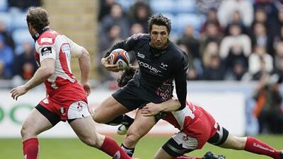 Gavin Henson of Ospreys is tackled by Gloucester's Anthony Allen. The Wales centre's selection for the forthcoming British and Irish Lions tour to South Africa is in doubt after he injured an ankle during the game.