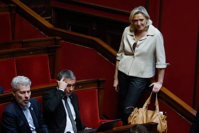 Marine Le Pen watches a questions to a government session at the French National Assembly in Paris. EPA