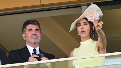 Simon Cowell and Lauren Silverman attend day one of the Royal Ascot meeting at Ascot Racecourse on June 15, 2021 in Ascot, England. WireImage