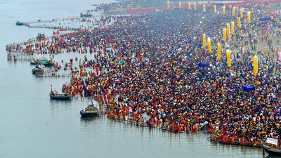 Hindu devotees offer prayers in the river Ganges for the festival of Chhath Puja in Patna, India. AFP