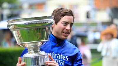 Jockey James Doyle with the trophy after winning the King's Stand Stakes with Blue Point on Day 1 of Royal Ascot. Press Association