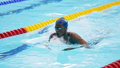 Yaqoub Al Saadi of Al Ain competes in the 400-metre medley at Hamdan Sports Complex in Dubai. Satish Kumar / The National