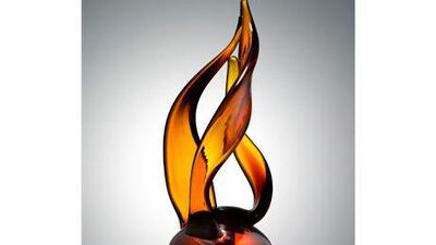 Fayza Al Mashjari's handblown amber-glass design will be awarded to one of the world's best players in just eight days.