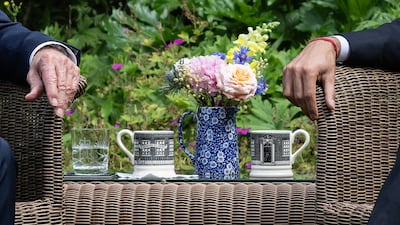 Downing Street-themed mugs were used by the Prime Minister and President. AFP