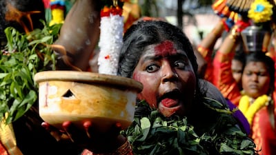 A Hindu devotee in procession during Thaipusam at Batu Caves in Kuala Lumpur, Malaysia, February 8, 2020. Reuters