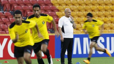 Jordan coach Ray Wilkins watches his players train ahead of their Asian Cup Group D match against Iraq at Suncorp Stadium in Brisbane on January 11, 2015. Edgar Su / Reuters