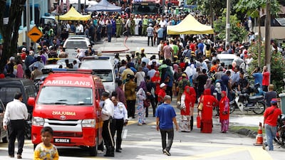 Religious school Darul Quran Ittifaqiyah is cordoned off after a fire broke out in Kuala Lumpur, Malaysia. Lai Seng Sin / Reuters